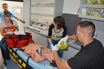 EMS students practice in the ambulance simulator